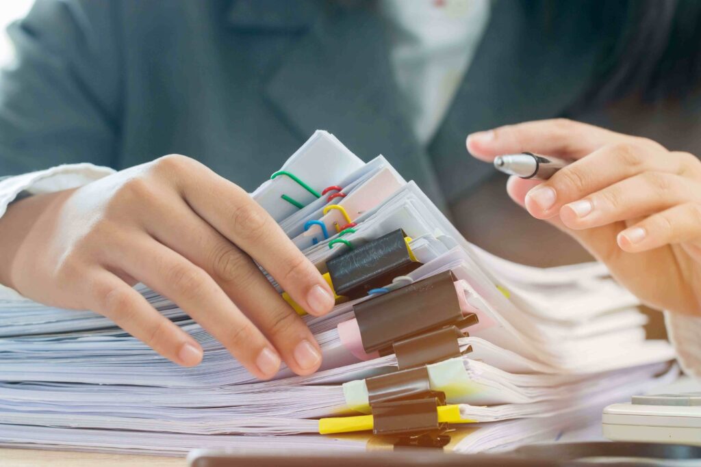 accounting planning budget concept business woman offices working arranging documents min 2